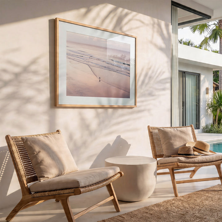 Lone Surfer on a Pink Beach I, Costa Rica wall art in a modern interior
