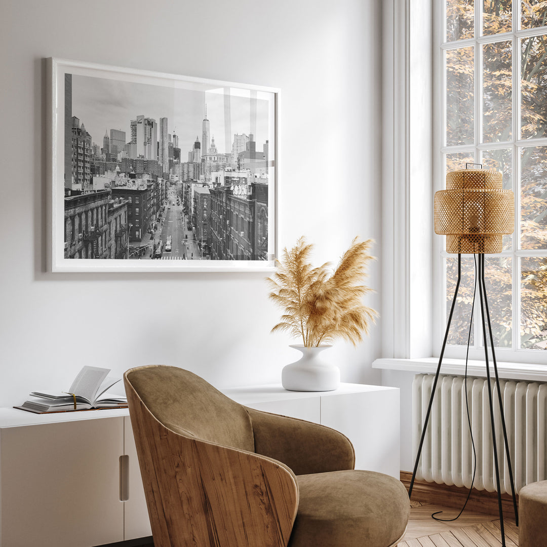 Lower Manhattan Street View, New York City – B&amp;W wall art displayed in a room setting