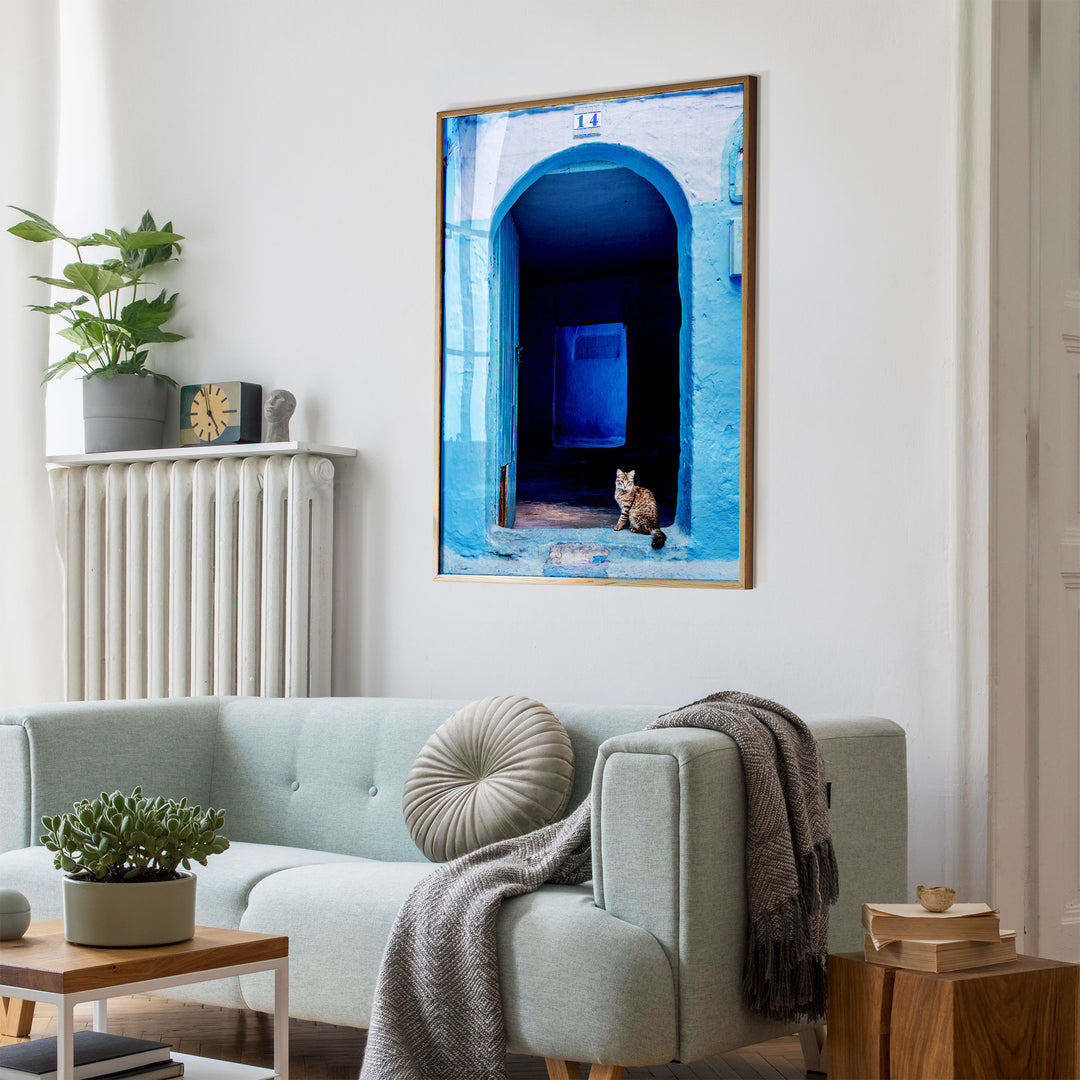 Cat in the Blue Doorway, Chefchaouen, Morocco wall art mockup in an interior