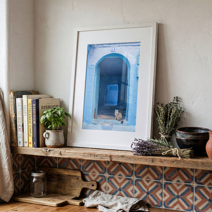 Cat in the Blue Doorway, Chefchaouen, Morocco framed print in a decorated room