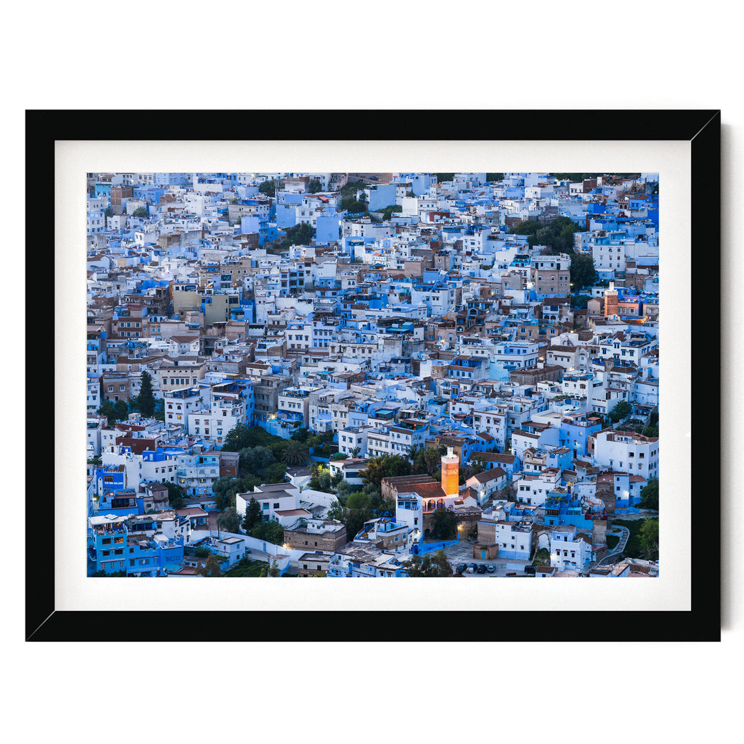 The image is a densely packed cityscape with numerous buildings in shades of blue and white, creating a visually striking and vibrant urban landscape.