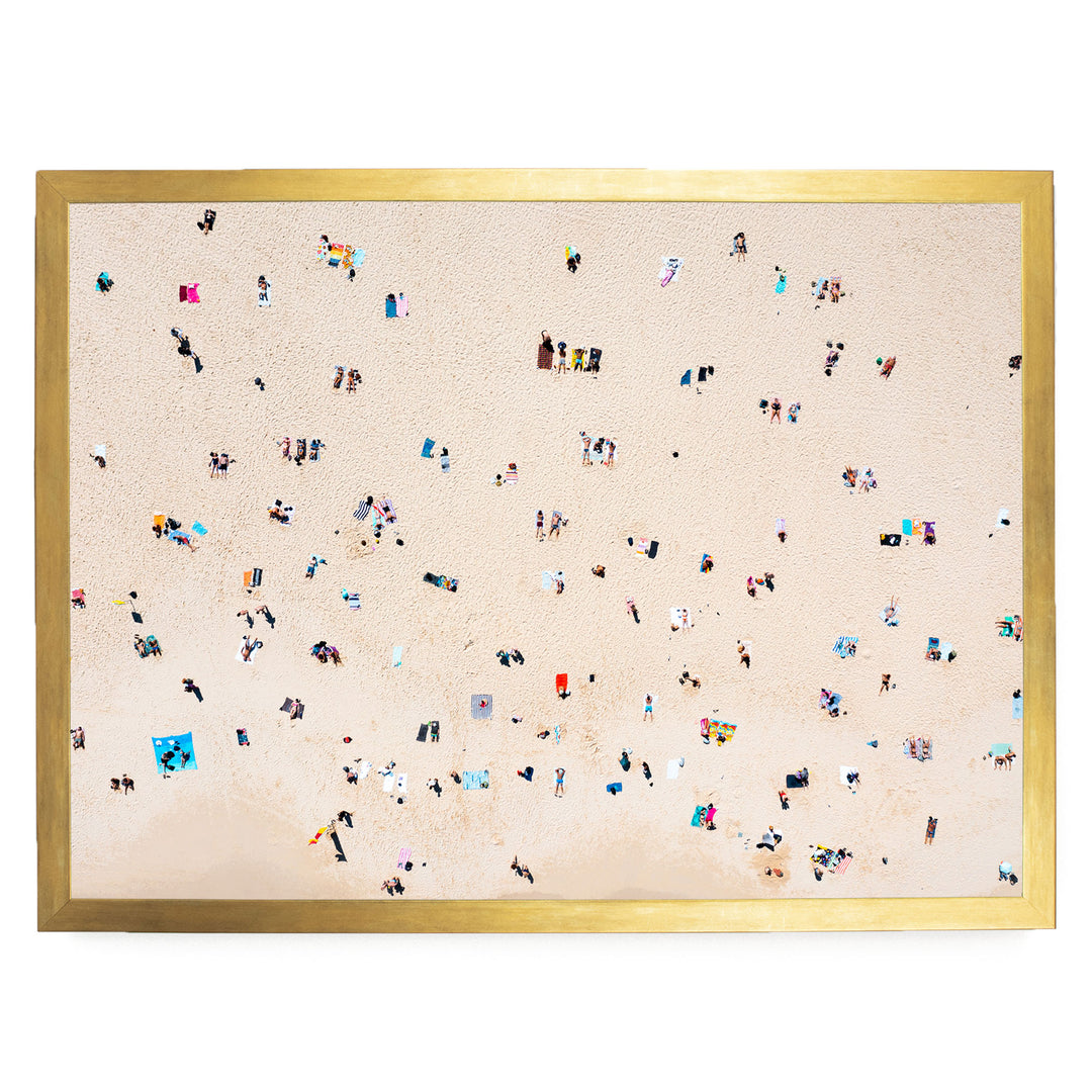 The image is a collage of multiple images depicting people on a beach, with a large number of individuals scattered across the sandy surface.