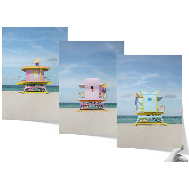 A collage of three colorful lifeguard towers on a beach, with each tower featuring a unique design and color scheme.