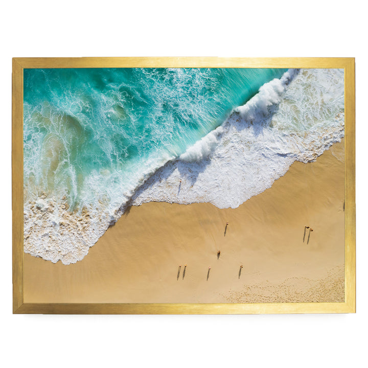 a serene beach scene with a clear turquoise ocean and a sandy shoreline.