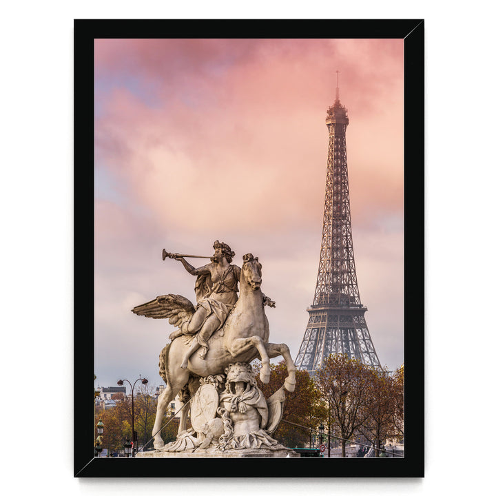 a statue of a winged man riding a rearing horse, with the Eiffel Tower visible in the background against a pink and purple sky.
