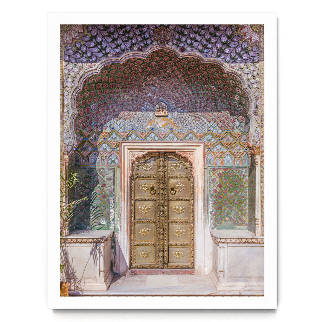 a beautifully decorated doorway with intricate patterns and designs, including a large archway and ornate golden doors.