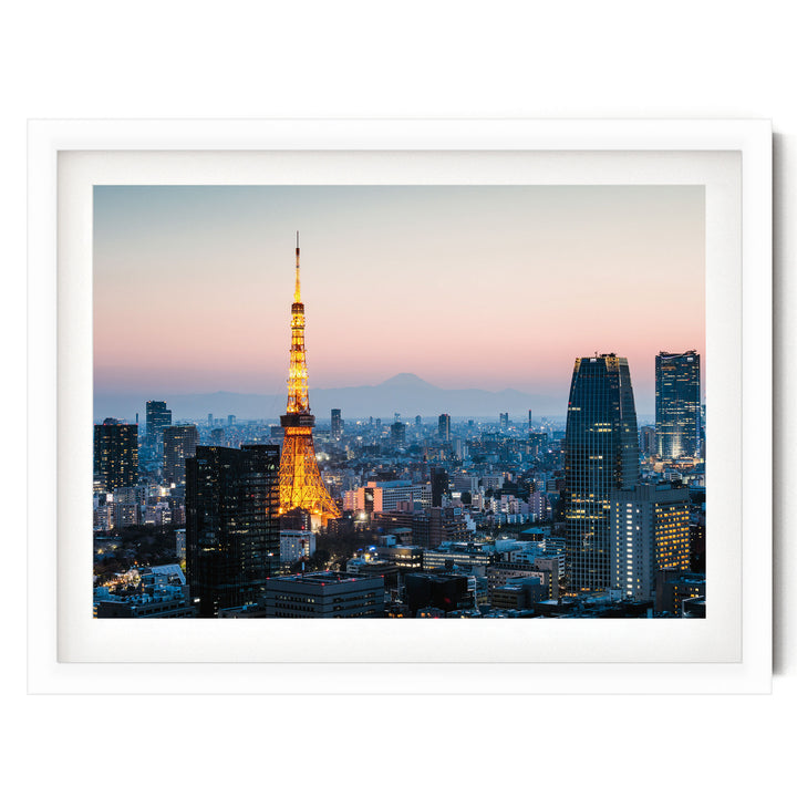 a cityscape at dusk, with the Tokyo Tower illuminated against the evening sky.