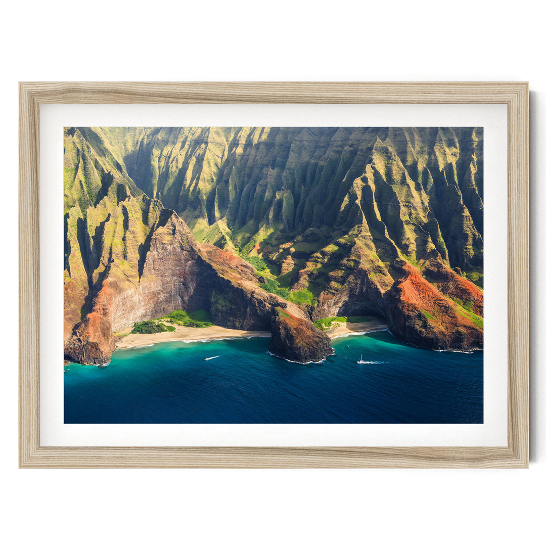 a stunning coastal landscape with towering cliffs, a deep blue ocean, and a small island in the center.