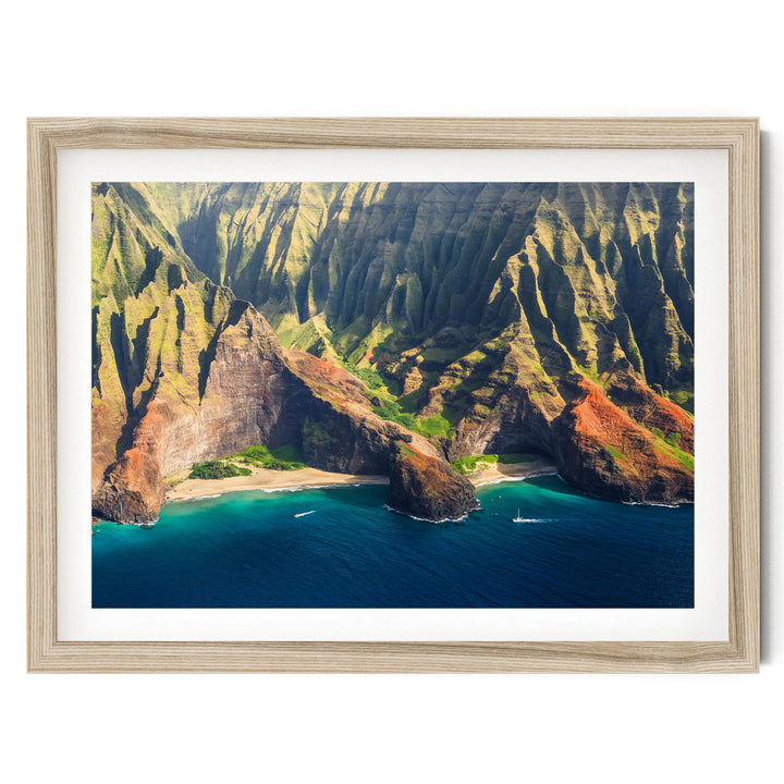 a stunning coastal landscape with towering cliffs, a deep blue ocean, and a small island in the center.