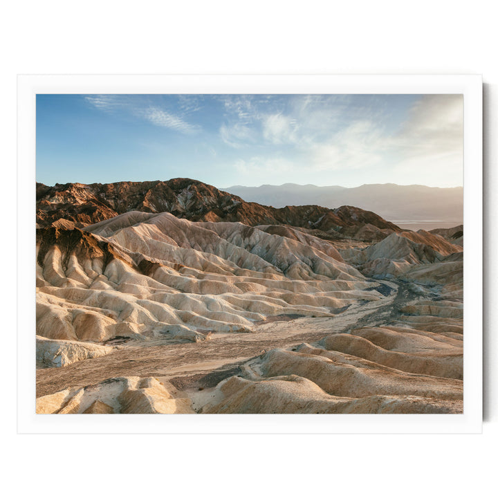 a vast, rugged landscape with rolling hills and valleys, showcasing the natural beauty of the terrain.