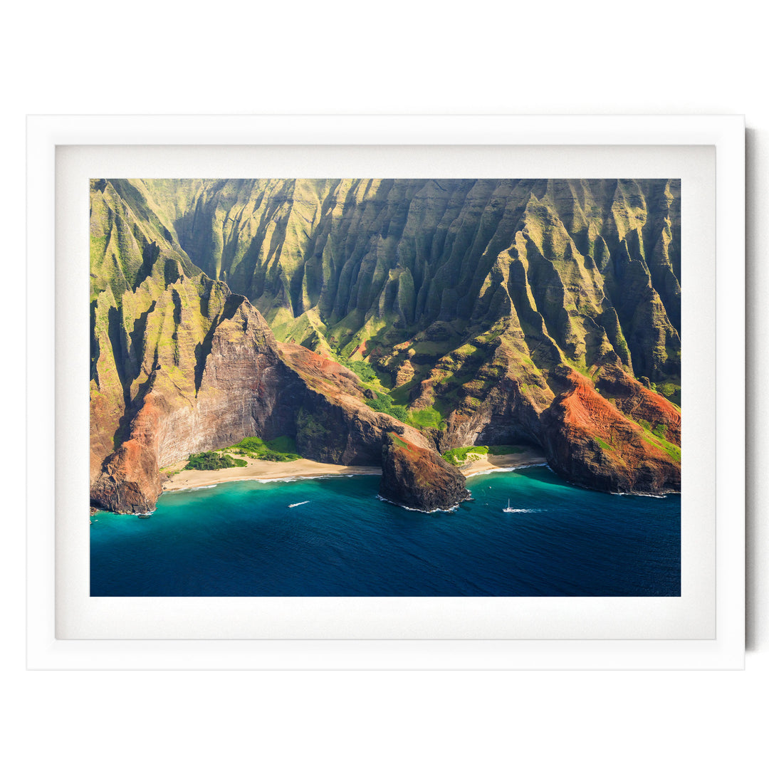 a stunning coastal landscape with towering cliffs, a deep blue ocean, and a small island in the center.
