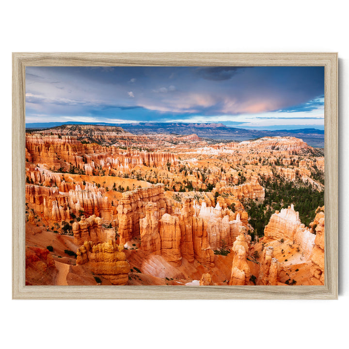 a breathtaking view of the Grand Canyon, showcasing its vast and rugged landscape with towering red rock formations and a dramatic cloudy sky.