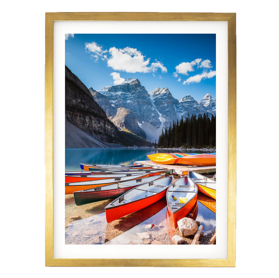 Canoes at Moraine Lake, Banff, Canada – fine art print in a gold frame with white mat