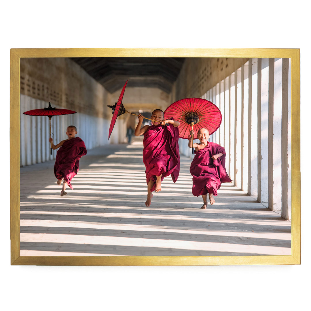 Joyful Monks II, Southeast Asia – fine art print in a gold frame, no mat