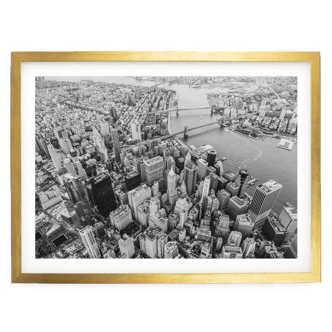 Flying over Manhattan, New York City – fine art print in a gold frame with white mat