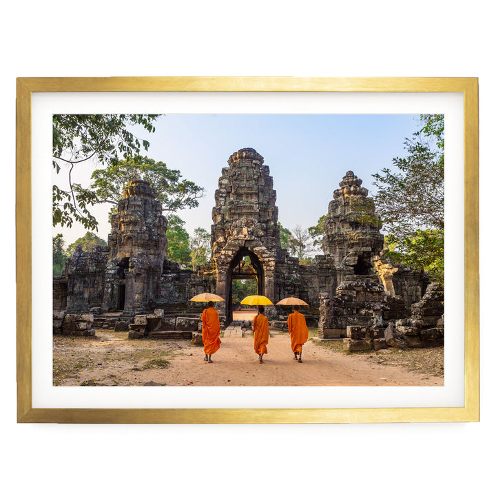 Monks at Angkor Wat, Cambodia – fine art print in a gold frame with white mat