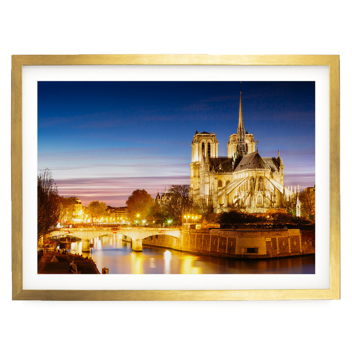Notre-Dame at Night, Paris, France – fine art print in a gold frame with white mat