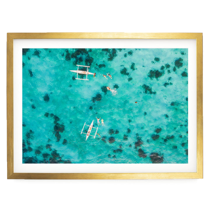 Snorkeling in the Sea, Maldives – fine art print in a gold frame with white mat