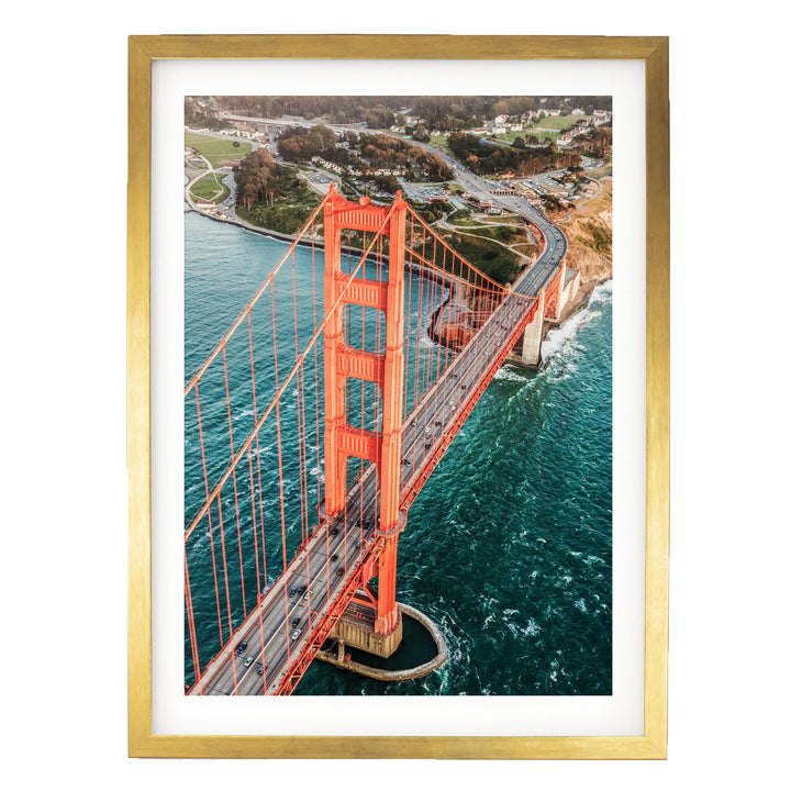 Flying over the Golden Gate Bridge I, San Francisco – fine art print in a gold frame with white mat