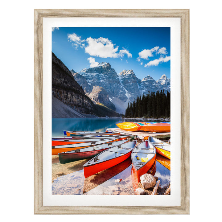 Canoes at Moraine Lake, Banff, Canada – fine art print in a natural frame with white mat
