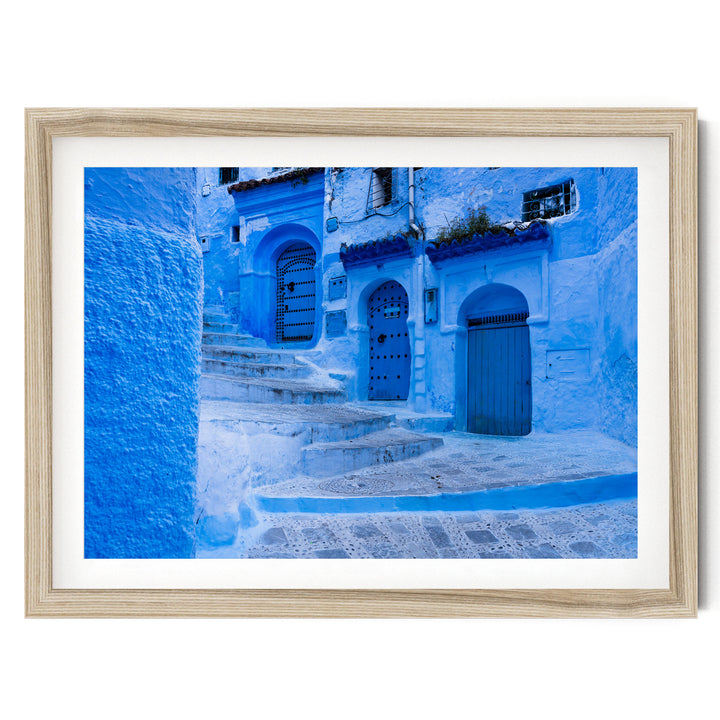 In the Streets of Chefchaouen, Morocco – fine art print in a natural frame with white mat