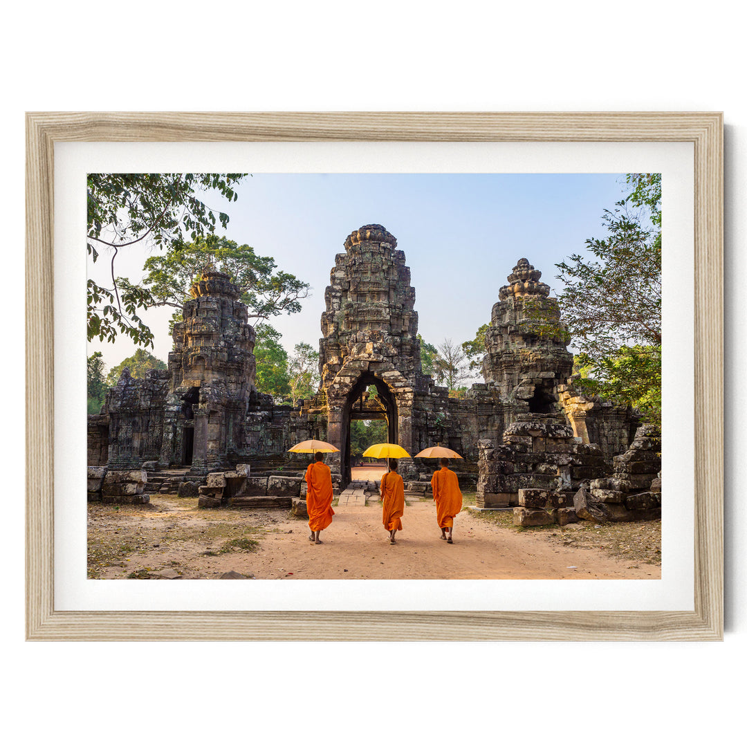 Monks at Angkor Wat, Cambodia – fine art print in a natural frame with white mat