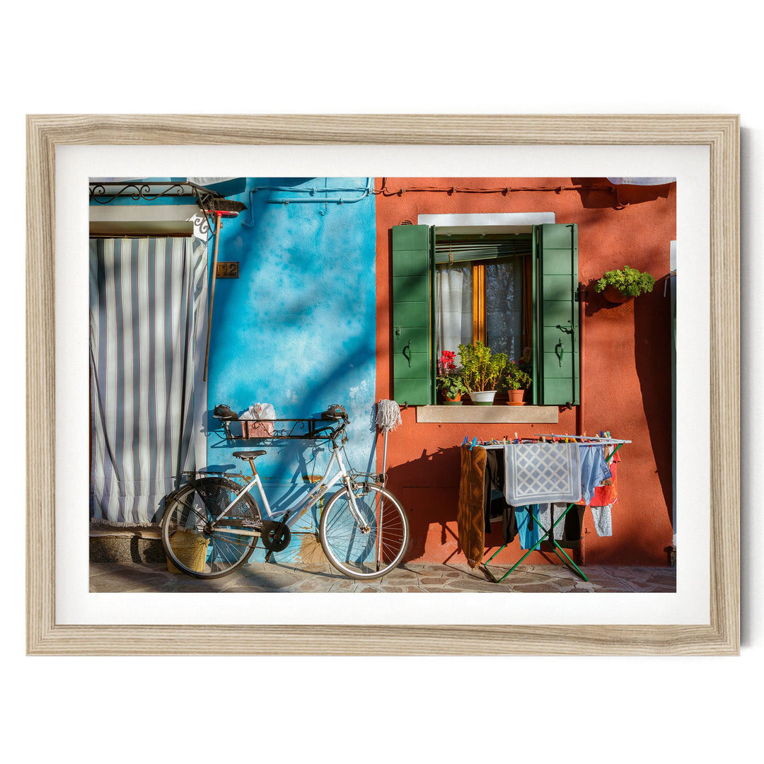 Colourful Burano, Venice, Italy – fine art print in a natural frame with white mat