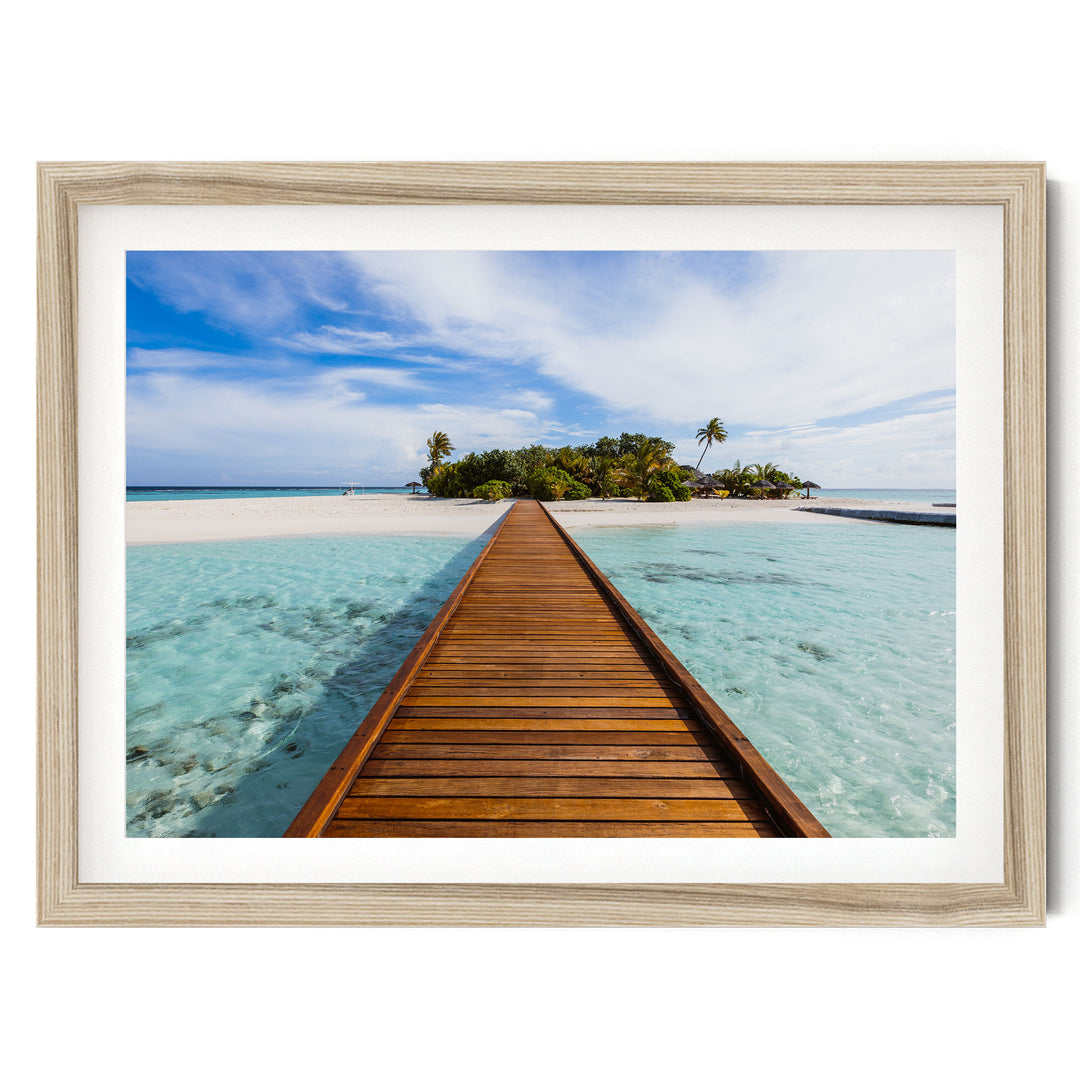 Jetty to the Island, Maldives – fine art print in a natural frame with white mat