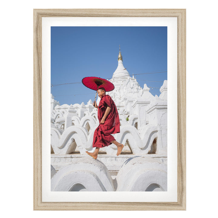 Novice Monk at the Temple, Myanmar – fine art print in a natural frame with white mat