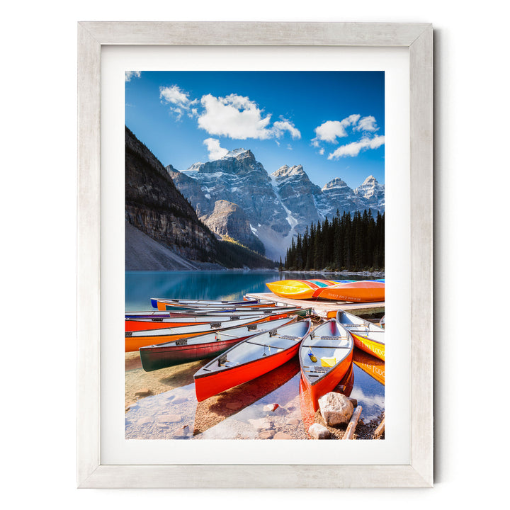 Canoes at Moraine Lake, Banff, Canada – fine art print in a silver frame with white mat