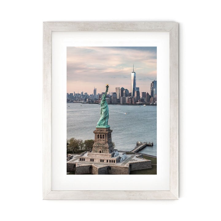 Statue of Liberty and New York Skyline II – fine art print in a silver frame with white mat
