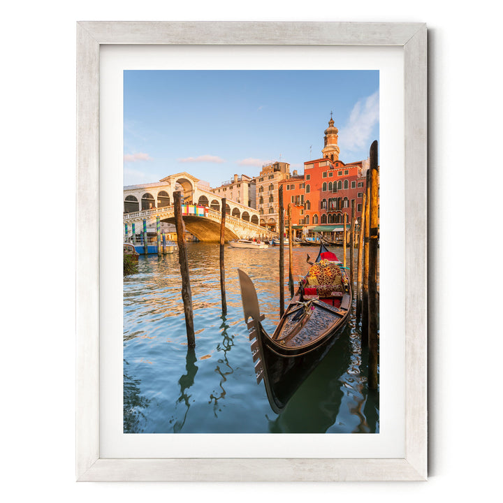 Gondola at the Rialto, Venice, Italy – fine art print in a silver frame with white mat