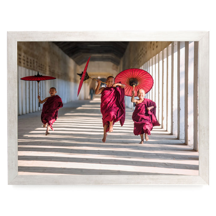 Joyful Monks II, Southeast Asia – fine art print in a silver frame, no mat