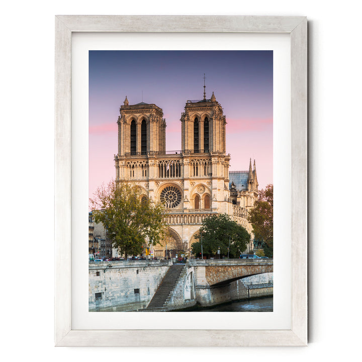 Sunset over Notre-Dame, Paris, France – fine art print in a silver frame with white mat