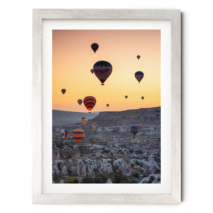 Hot Air Balloons over Cappadocia I, Turkey – fine art print in a silver frame with white mat