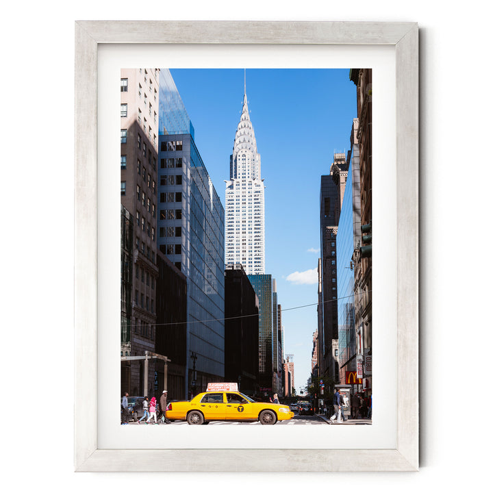 Yellow Cab, New York City – fine art print in a silver frame with white mat