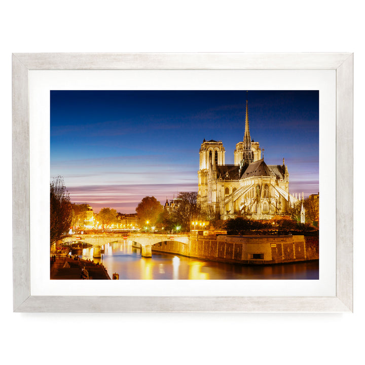 Notre-Dame at Night, Paris, France – fine art print in a silver frame with white mat