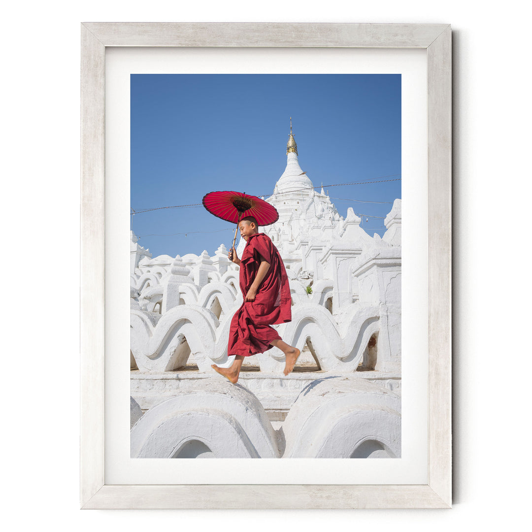 Novice Monk at the Temple, Myanmar – fine art print in a silver frame with white mat