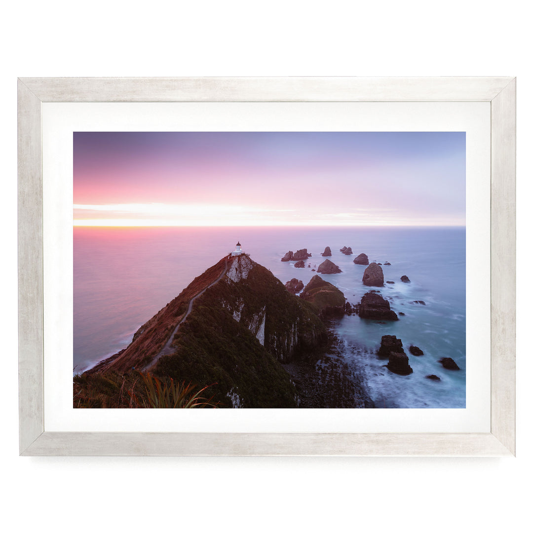Nugget Point, New Zealand – fine art print in a silver frame with white mat