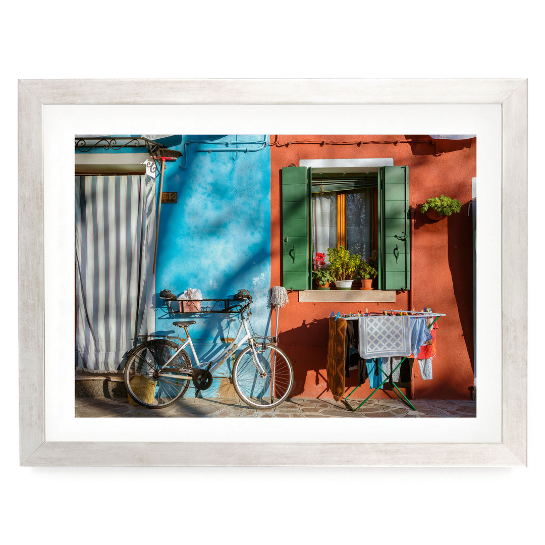 Colourful Burano, Venice, Italy – fine art print in a silver frame with white mat