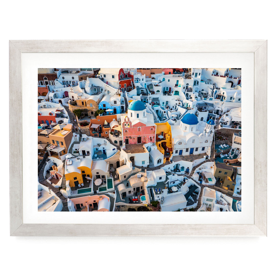 Santorini Colors, Oia, Greece – fine art print in a silver frame with white mat