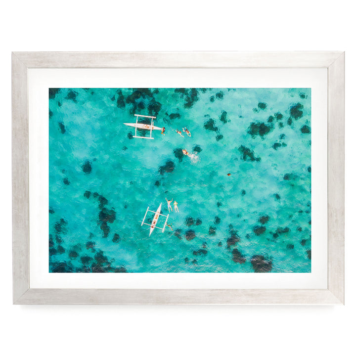 Snorkeling in the Sea, Maldives – fine art print in a silver frame with white mat
