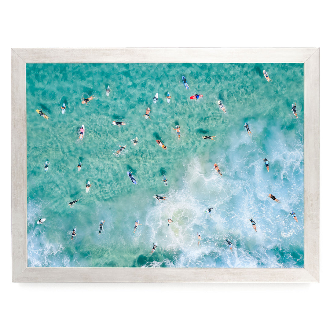 Surfers Paddling Out