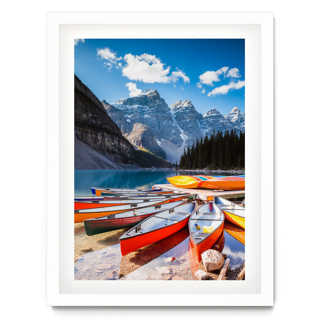 Canoes at Moraine Lake, Banff, Canada – fine art print in a white frame with white mat
