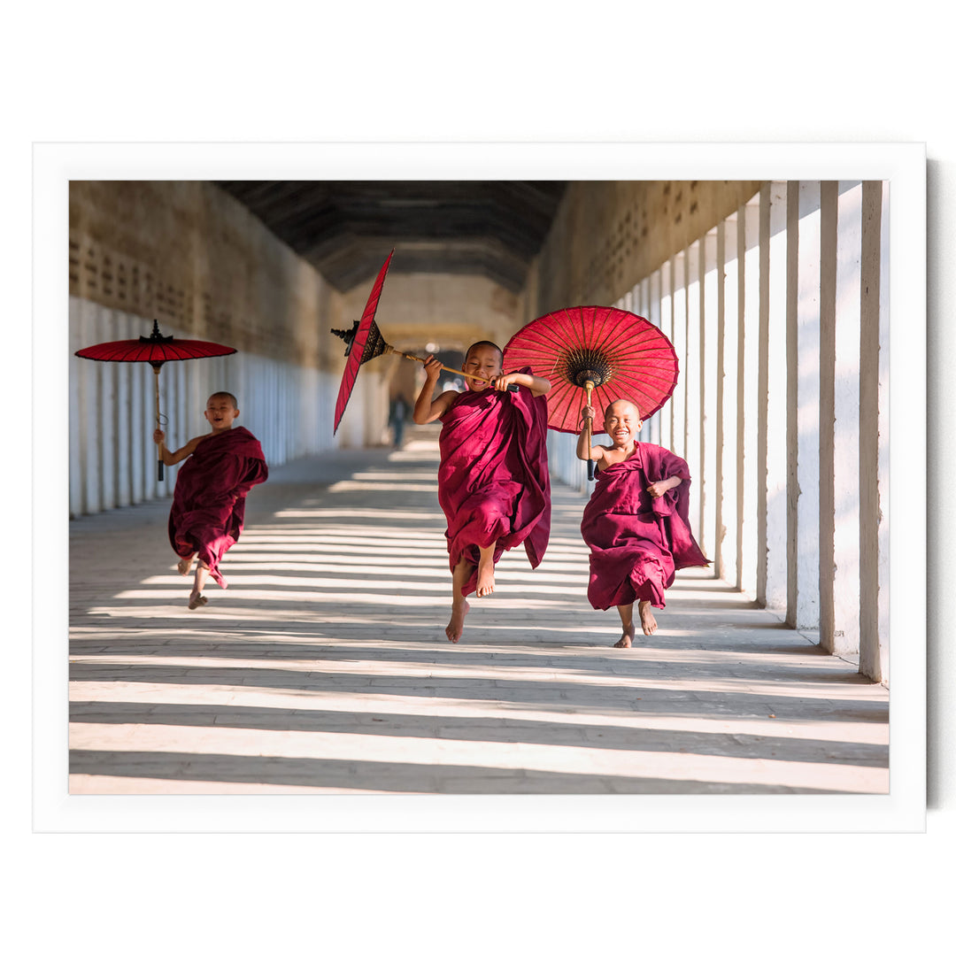 Joyful Monks II, Southeast Asia – fine art print in a white frame, no mat