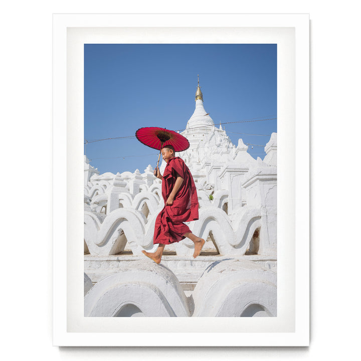Novice Monk at the Temple, Myanmar – fine art print in a white frame with white mat