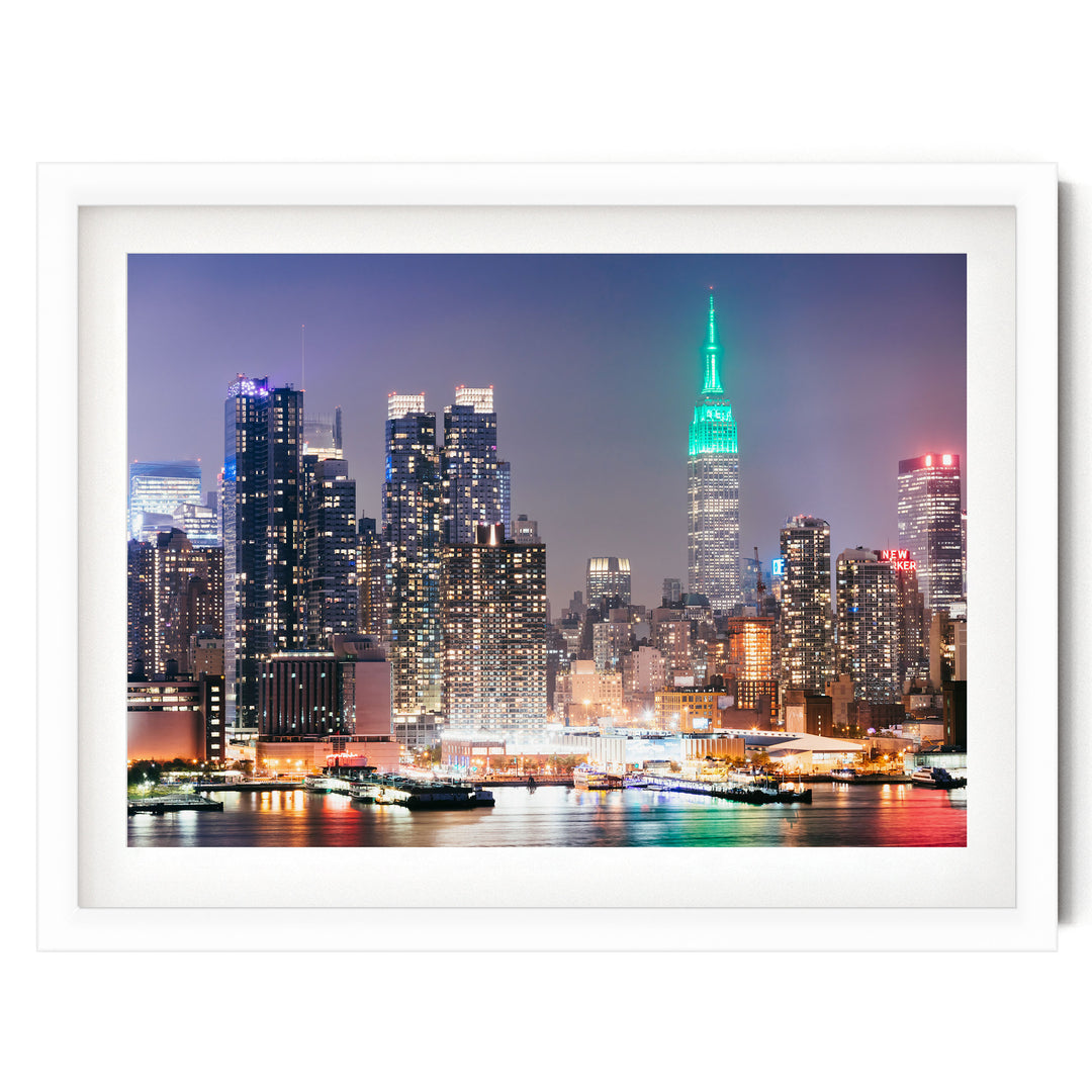 New York Skyline at Night – fine art print in a white frame with white mat