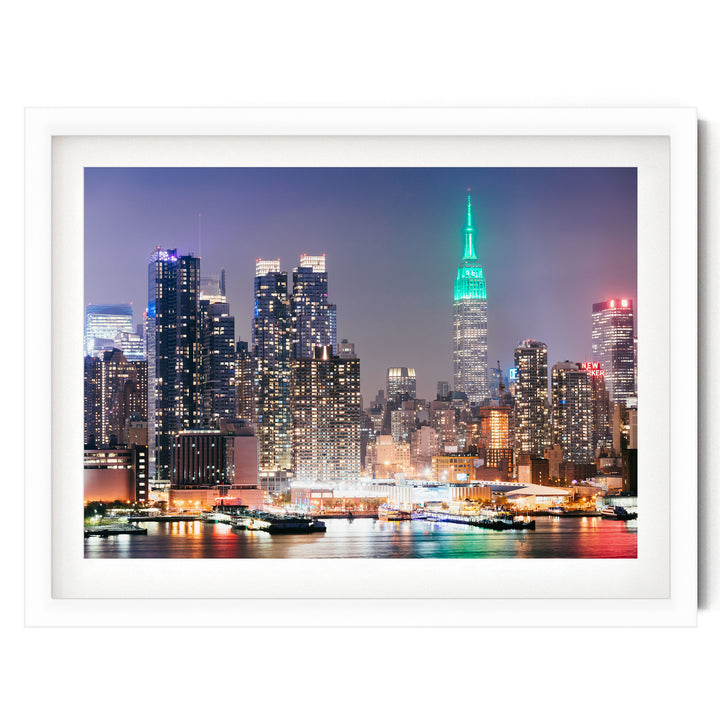 New York Skyline at Night – fine art print in a white frame with white mat